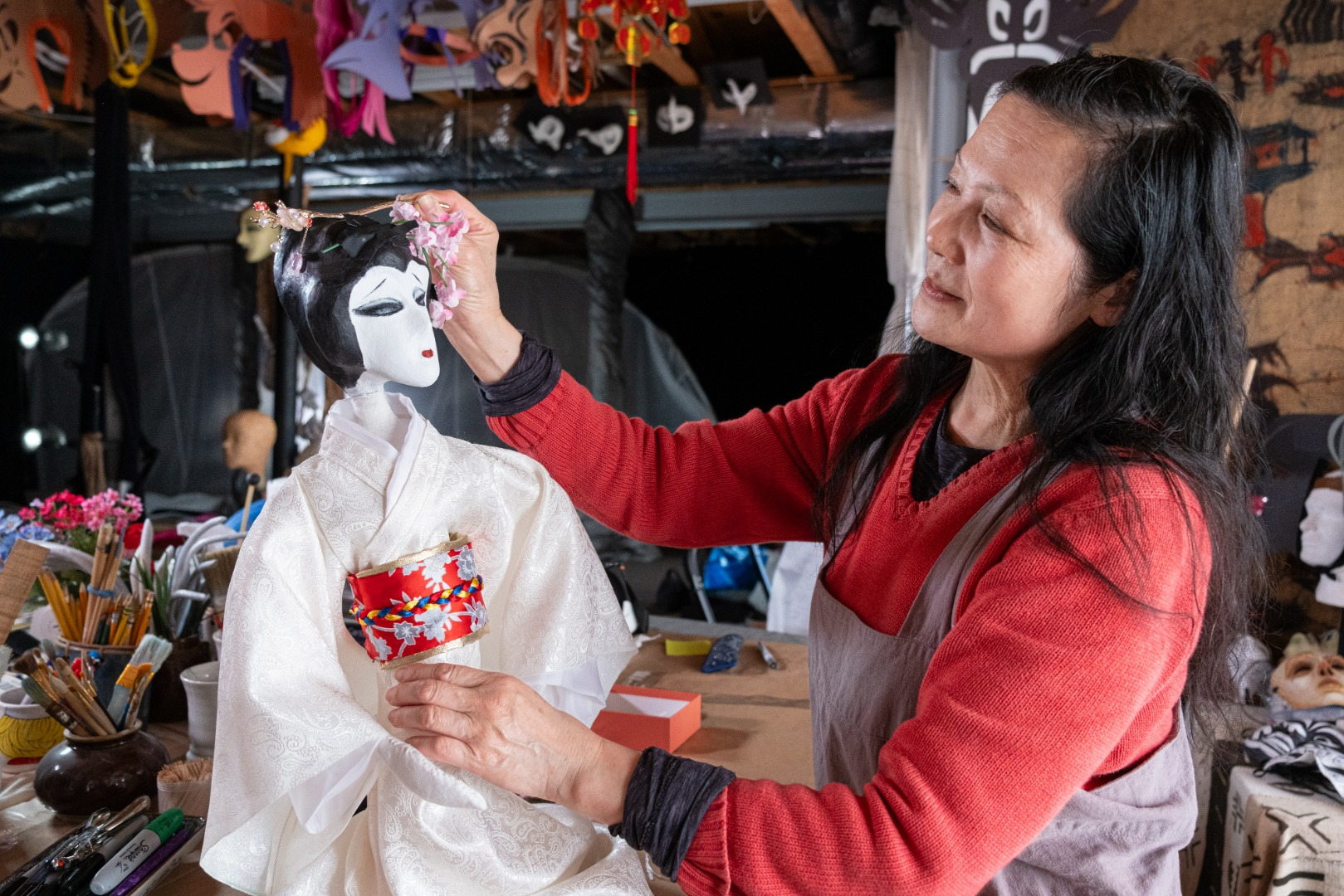 Hua Hua Zhang creating the Cio Cio San doll in her Philadelphia studio. Photo by Ray Bailey